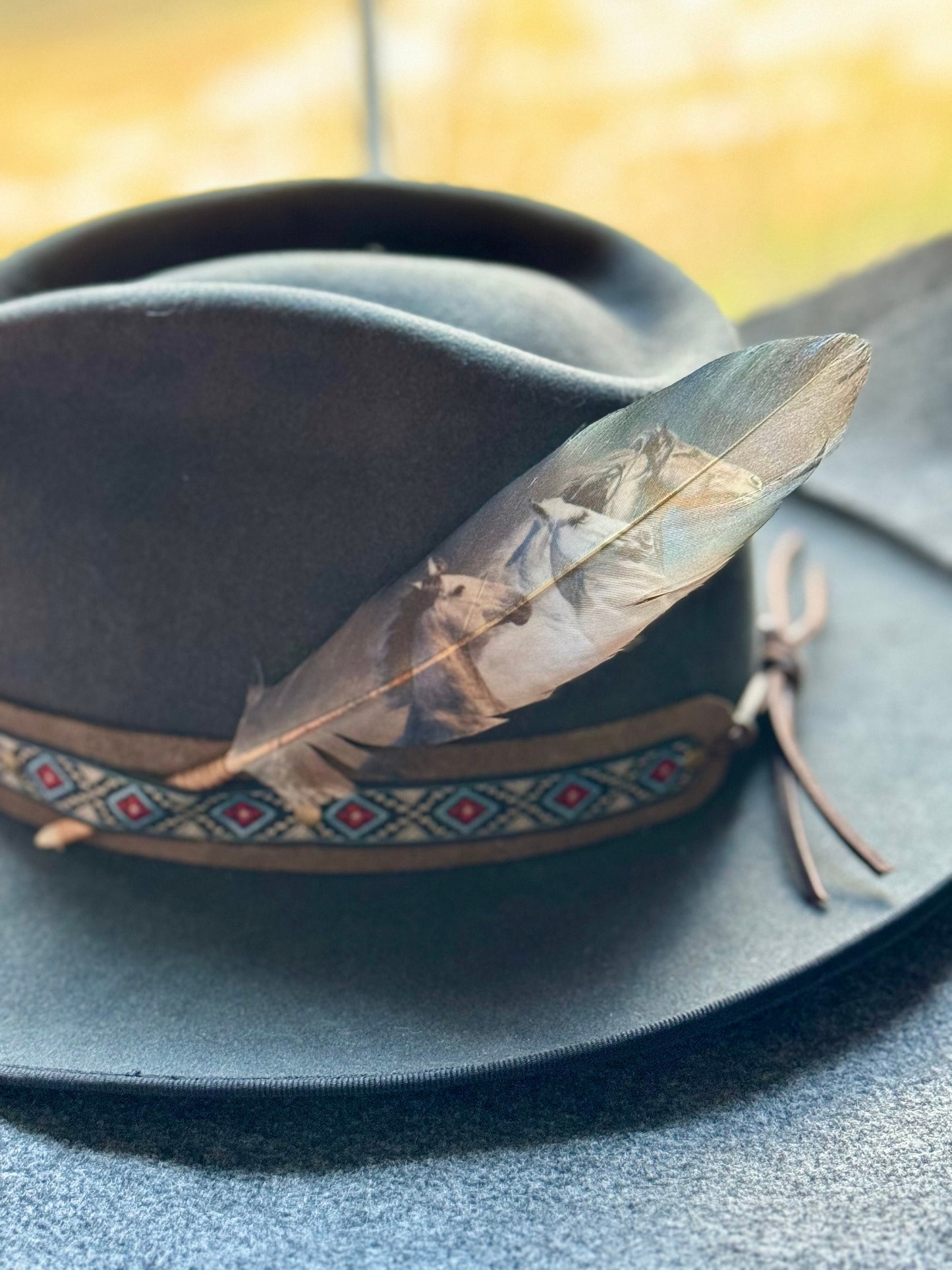 Handcrafted Dark Wild Horses feather accessory for Western hat bands