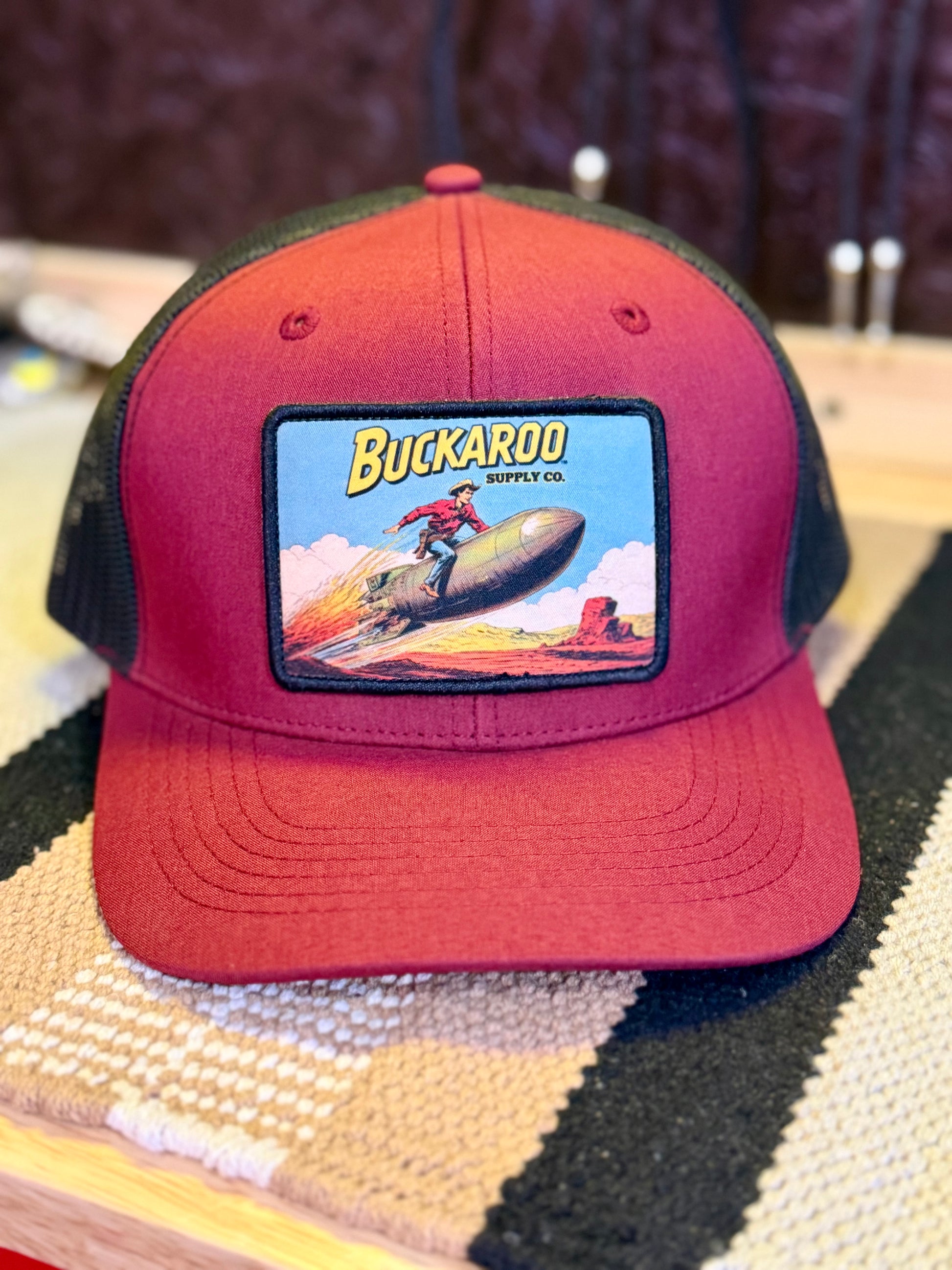 Atomic Buckaroo Western trucker hat in wine and black with atomic cowboy patch