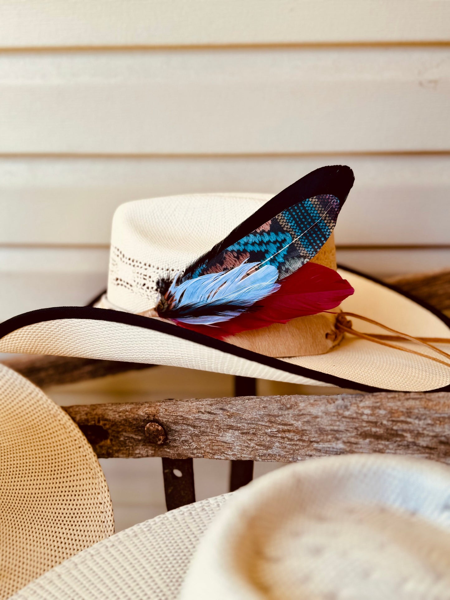 Buckaroo Supply Co. dark Southwestern Western hat feather. Handcrafted Night Weaver feather accessory for Western hat bands.