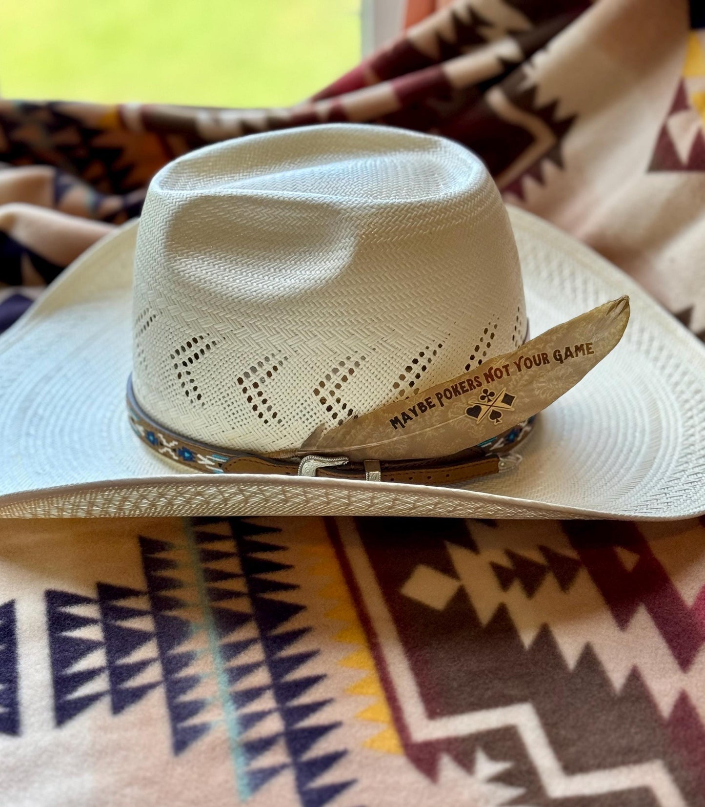 Maybe Poker’s Not Your Game Western hat feather on a white straw cowboy hat