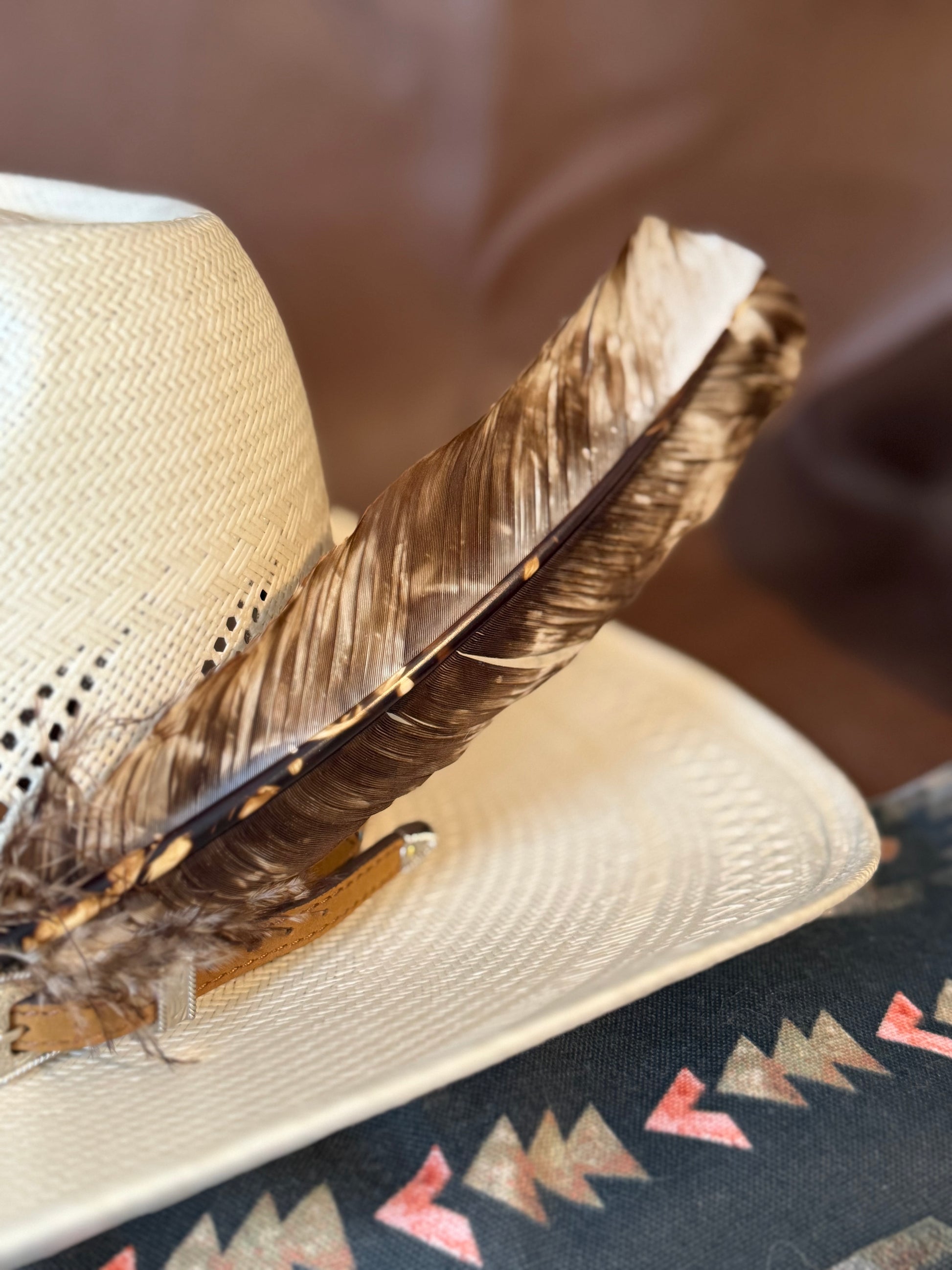 Brown cream marbled Western hat feather by Buckaroo Supply Co.