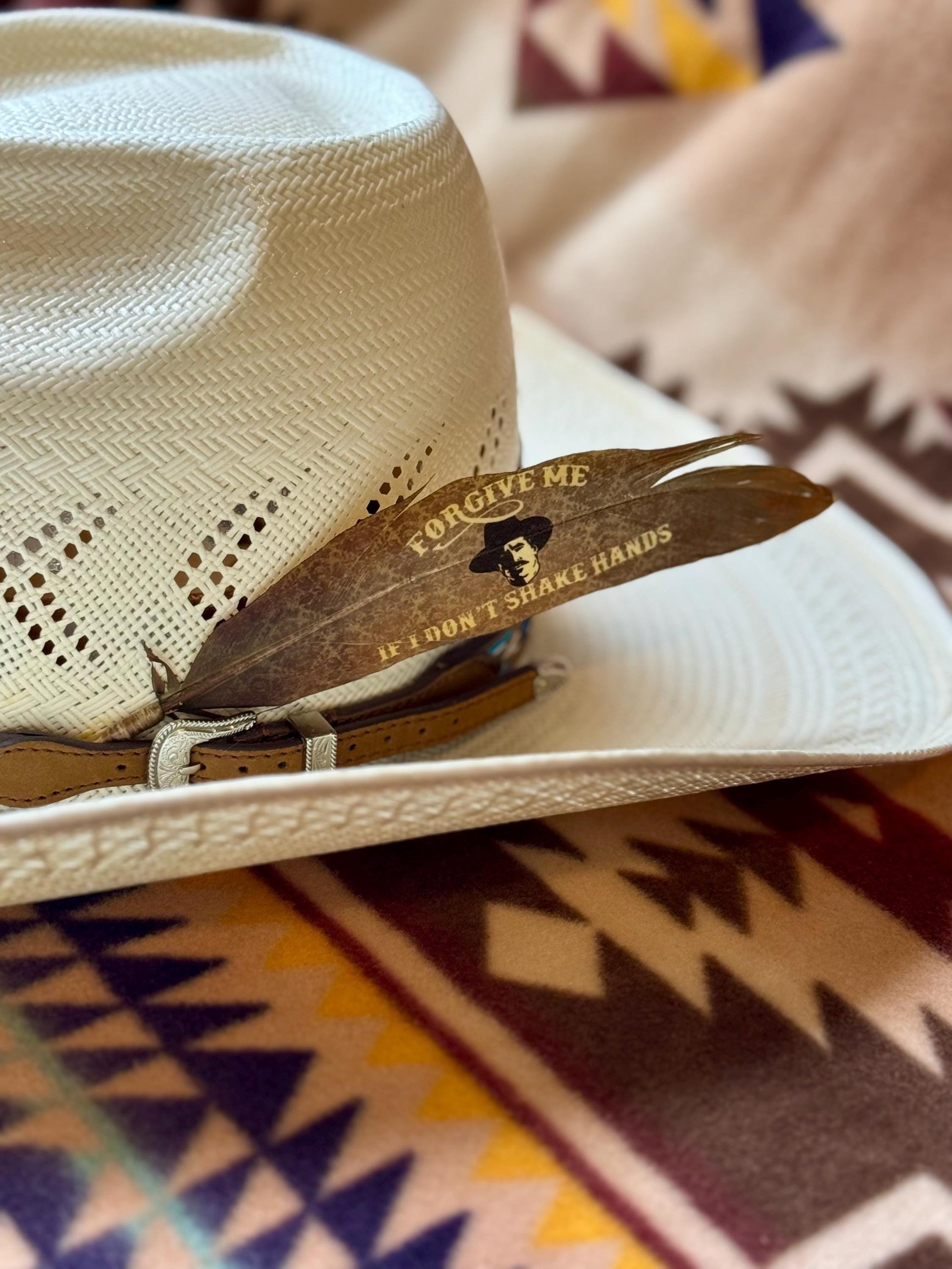 Sepia Old West cowboy hat feather with vintage Western artwork