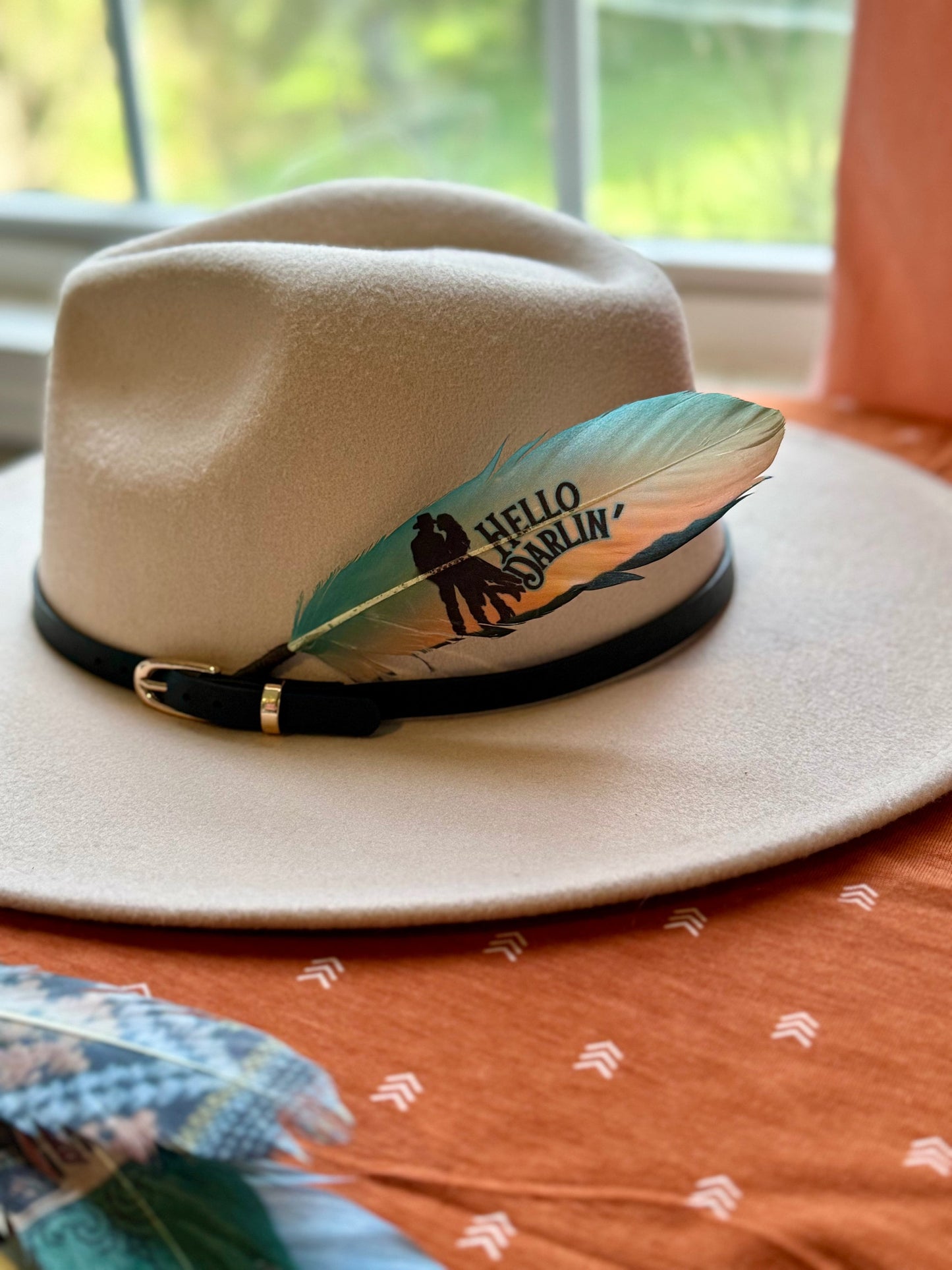 Buckaroo Supply Co. cowgirl Western hat feather in turquoise and peach tones