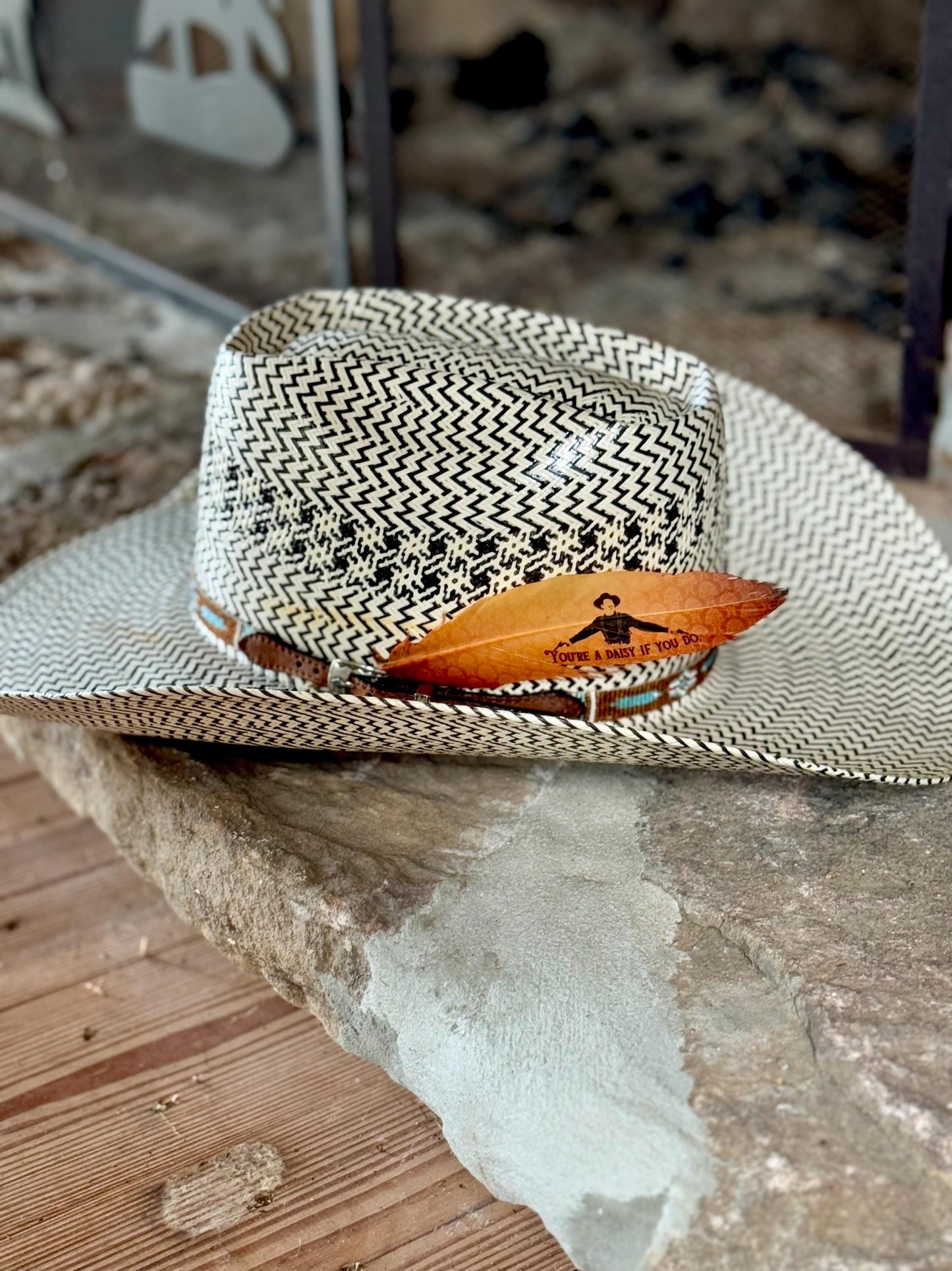 Daisy If You Do Western hat feather on a black and white straw cowboy hat