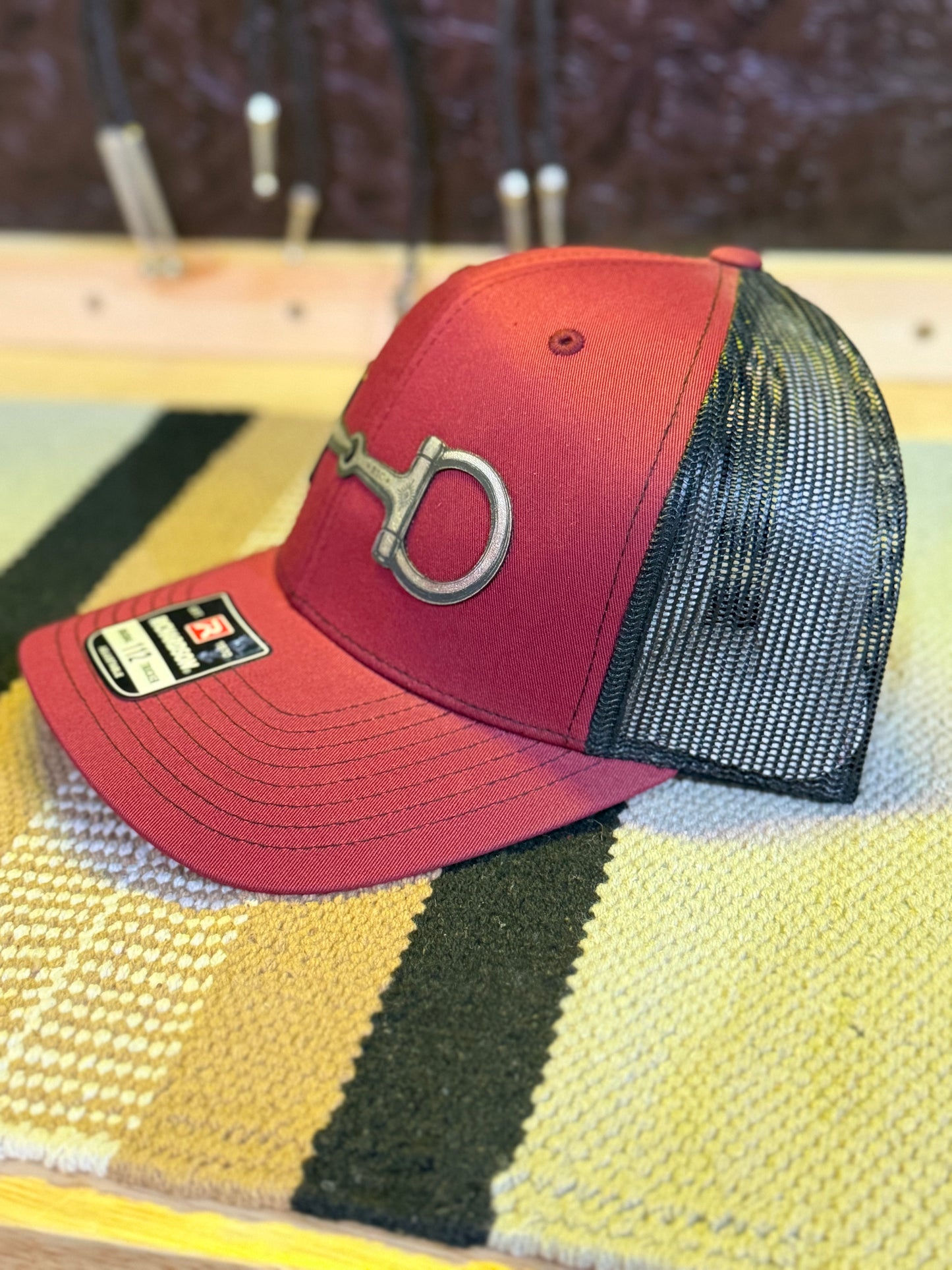 Cardinal and black mesh-back Western trucker hat by Buckaroo Supply Co.