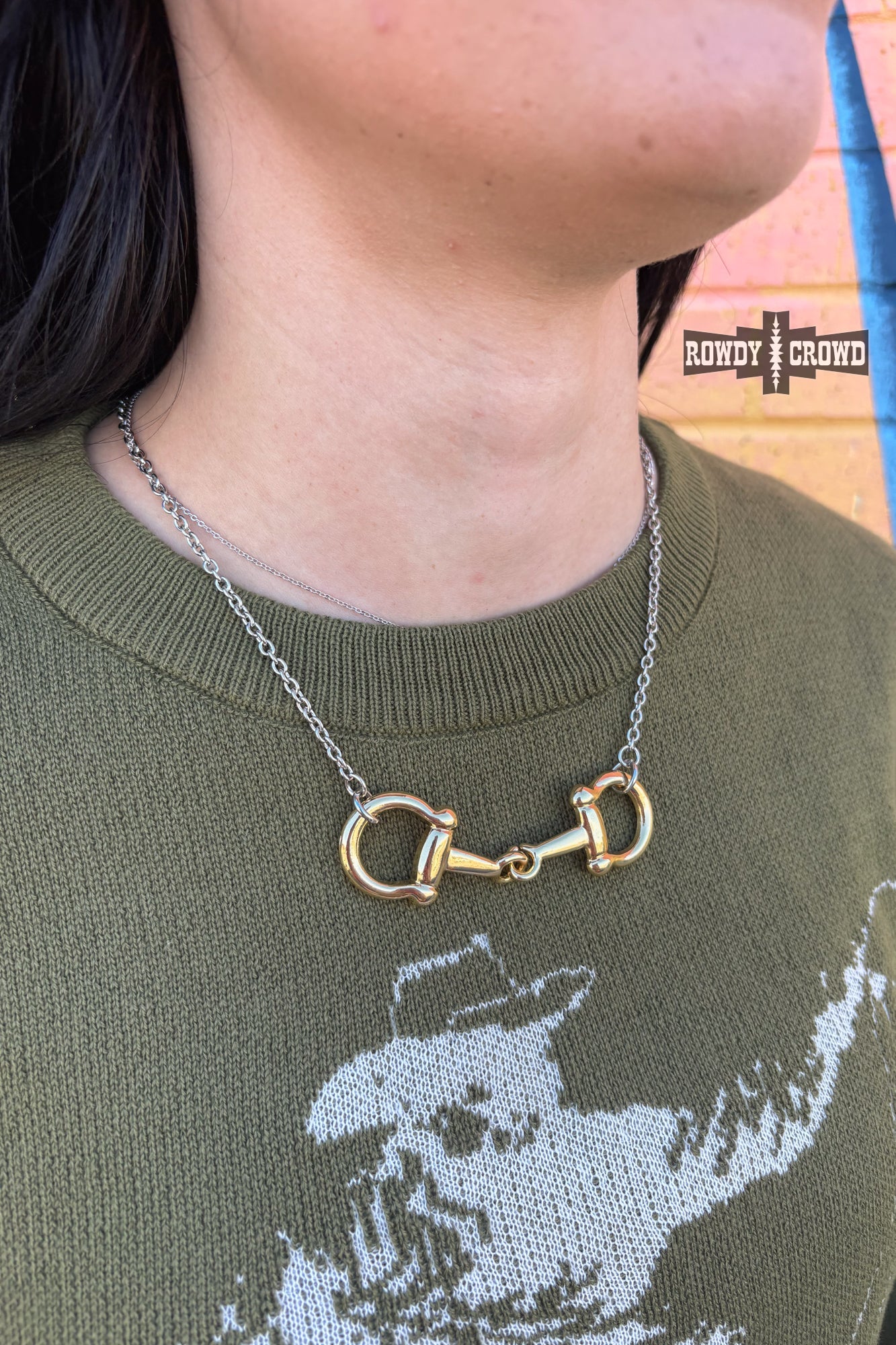 Western horse bit necklace styled with cowgirl outfit