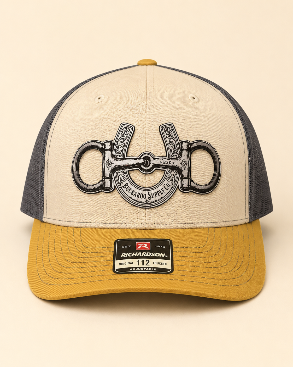 Mink Beige Charcoal and Amber Gold Richardson 112 Western trucker hat with snaffle bit and horseshoe design
