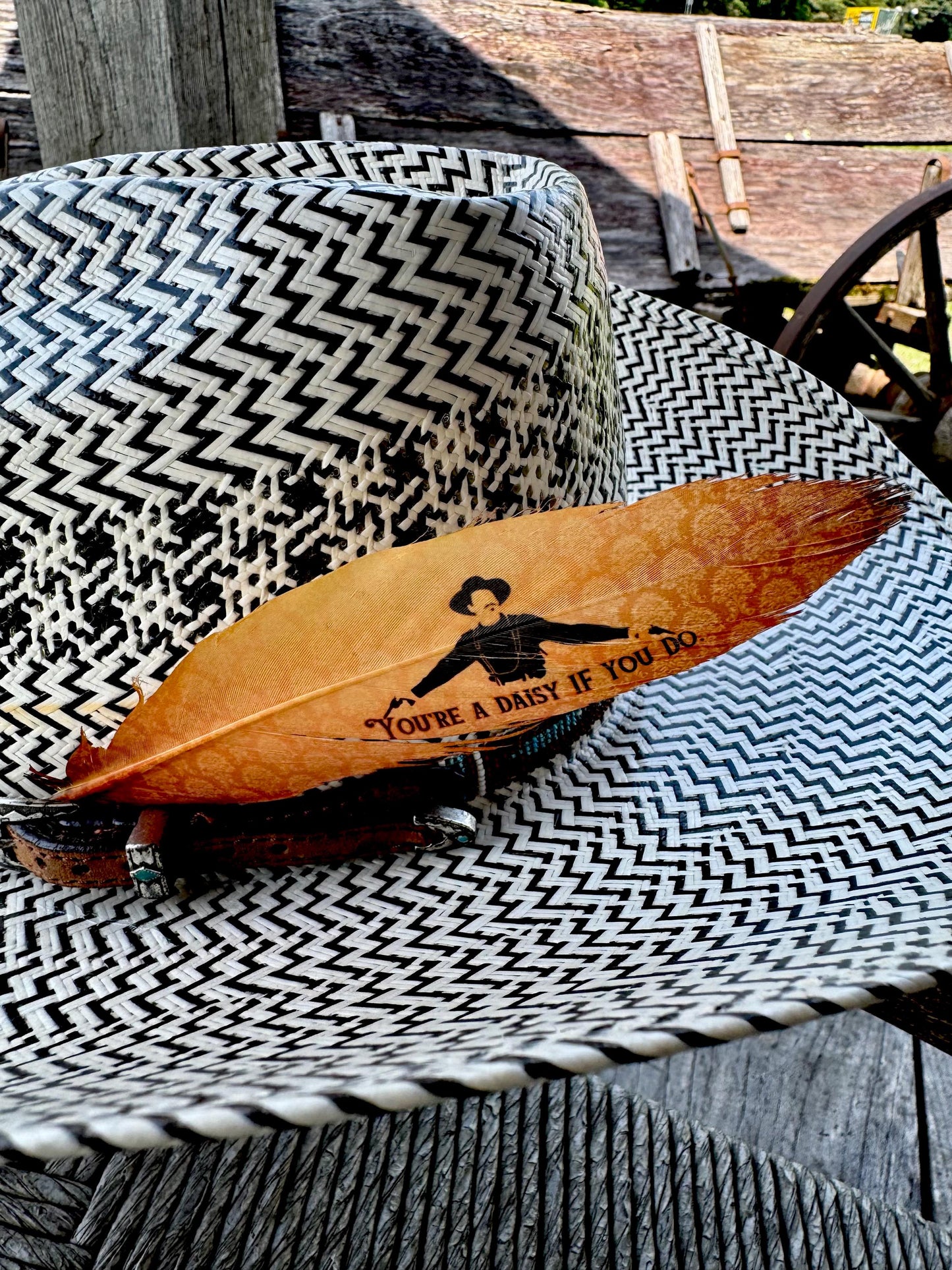 Buckaroo Supply Co. Western hat feather in warm golden tones