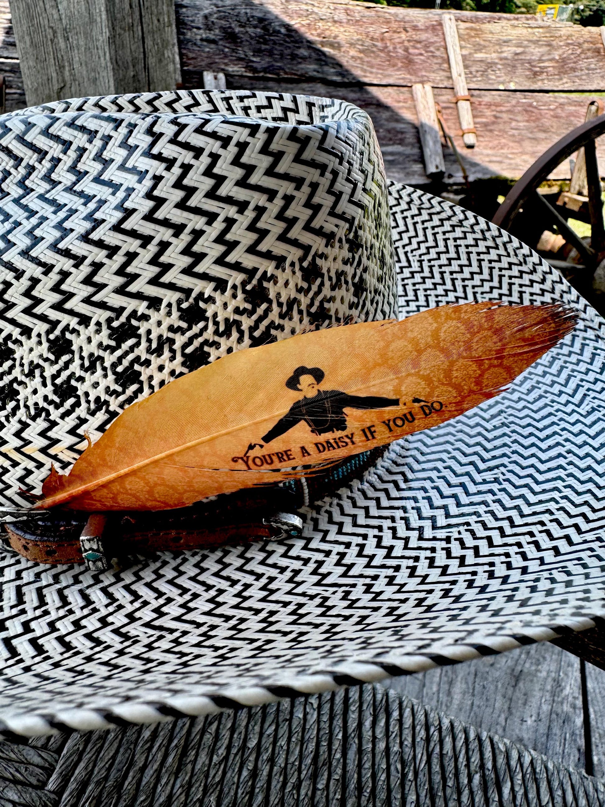 Buckaroo Supply Co. Western hat feather in warm golden tones