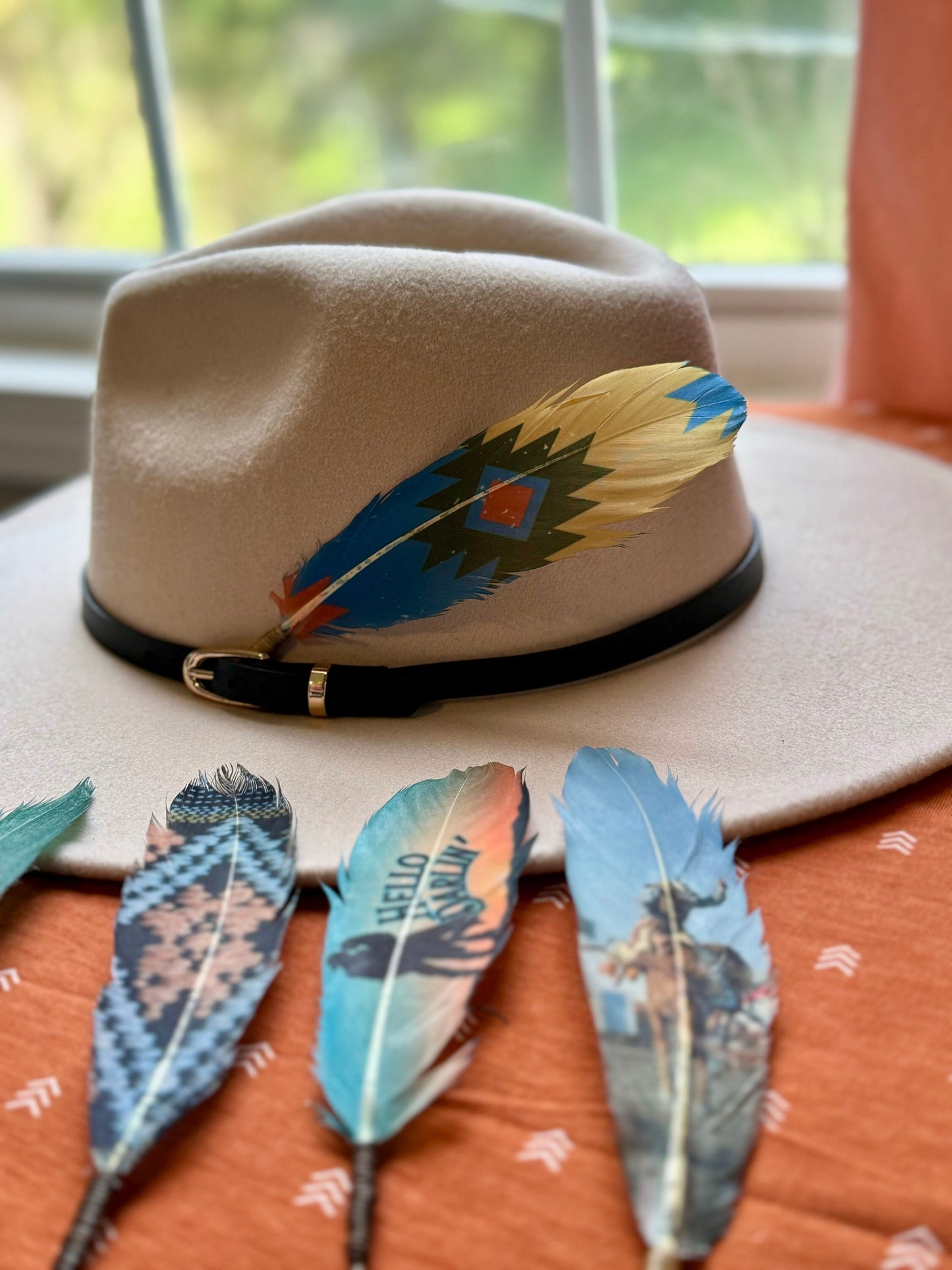 Southwestern Diamond Western hat feather on a cream hat