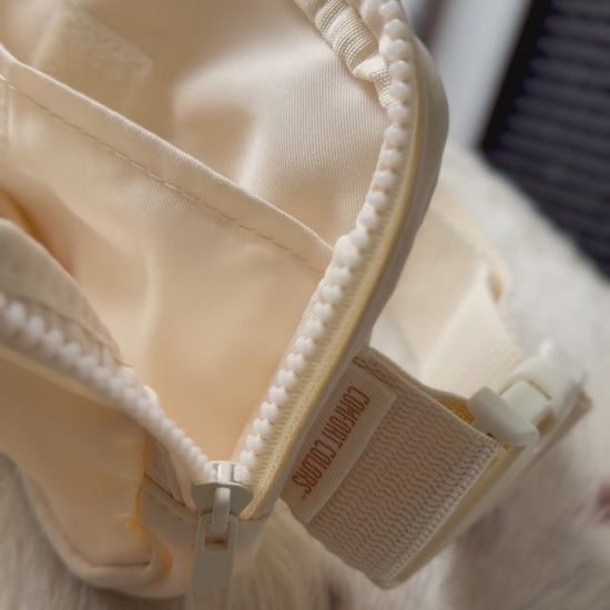 Interior video view of Buckaroo Rodeo Logo Western Explorer Sling Bag with zippered compartments