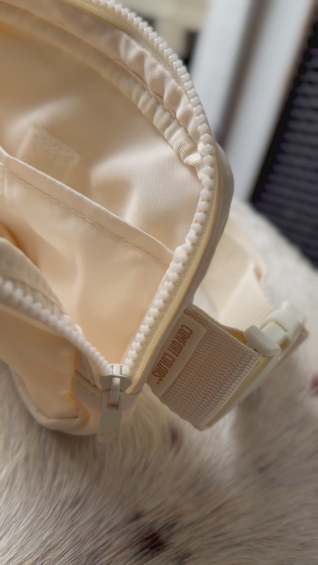 Interior video view of Buckaroo Rodeo Logo Western Explorer Sling Bag with zippered compartments