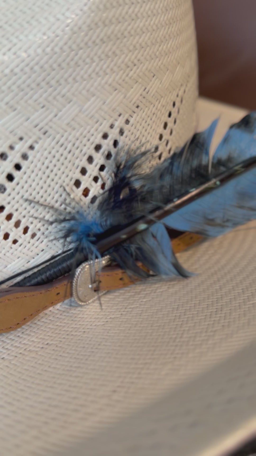 Blue and black marbled Western hat feather by Buckaroo Supply Co.