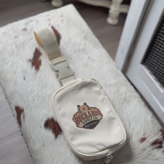 Close-up video of adjustable strap and buckle on Buckaroo Western Explorer Sling Bag