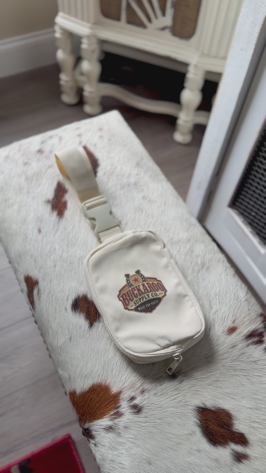 Close-up video of adjustable strap and buckle on Buckaroo Western Explorer Sling Bag